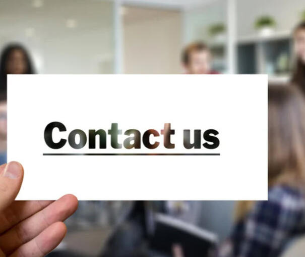 Contact Us Card being held up